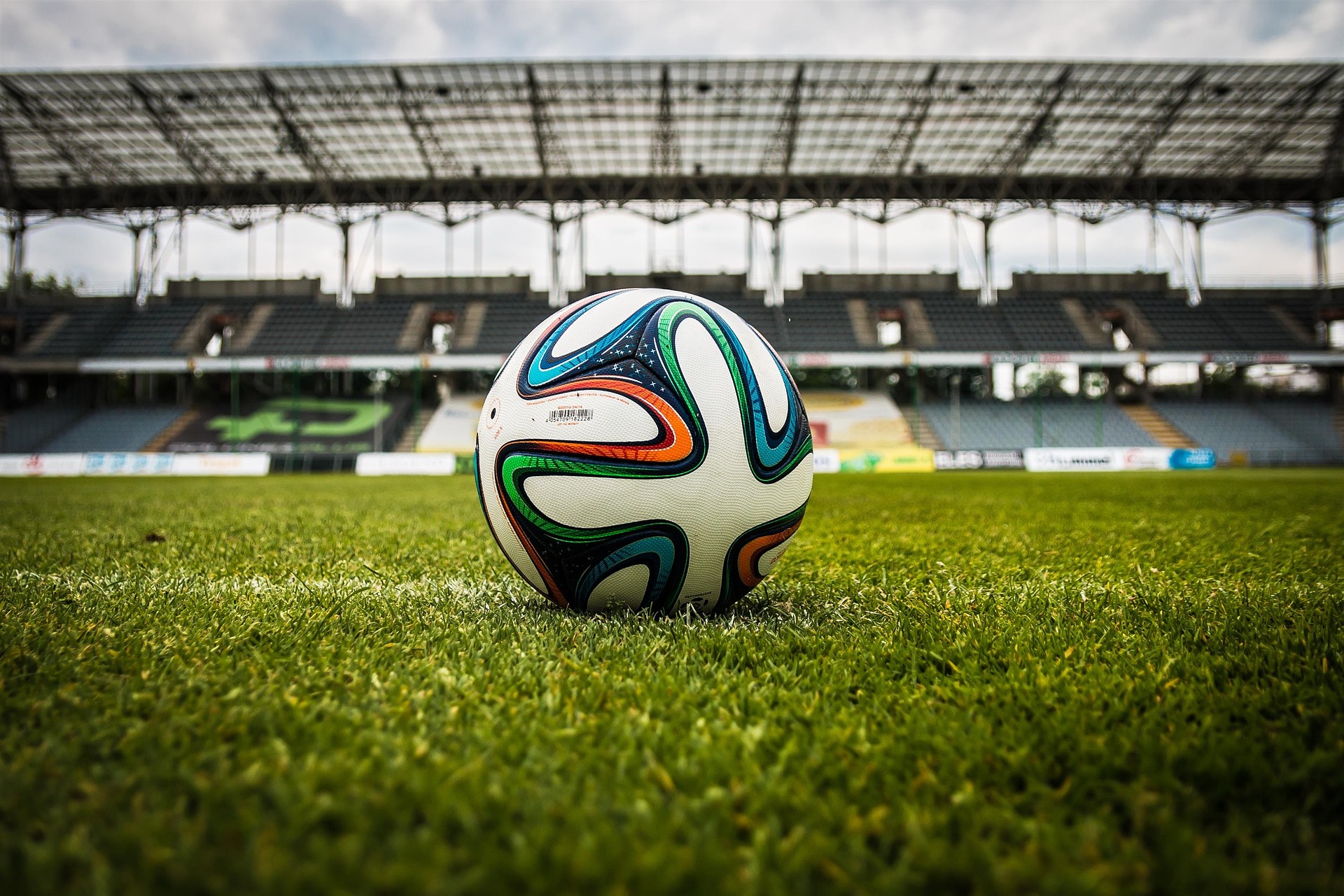 soccer ball on stadium field 